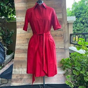 Taharai classic red dress with buttons and belt.
